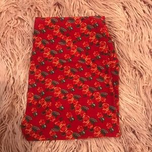 Lularoe one size os rose print leggings never worn